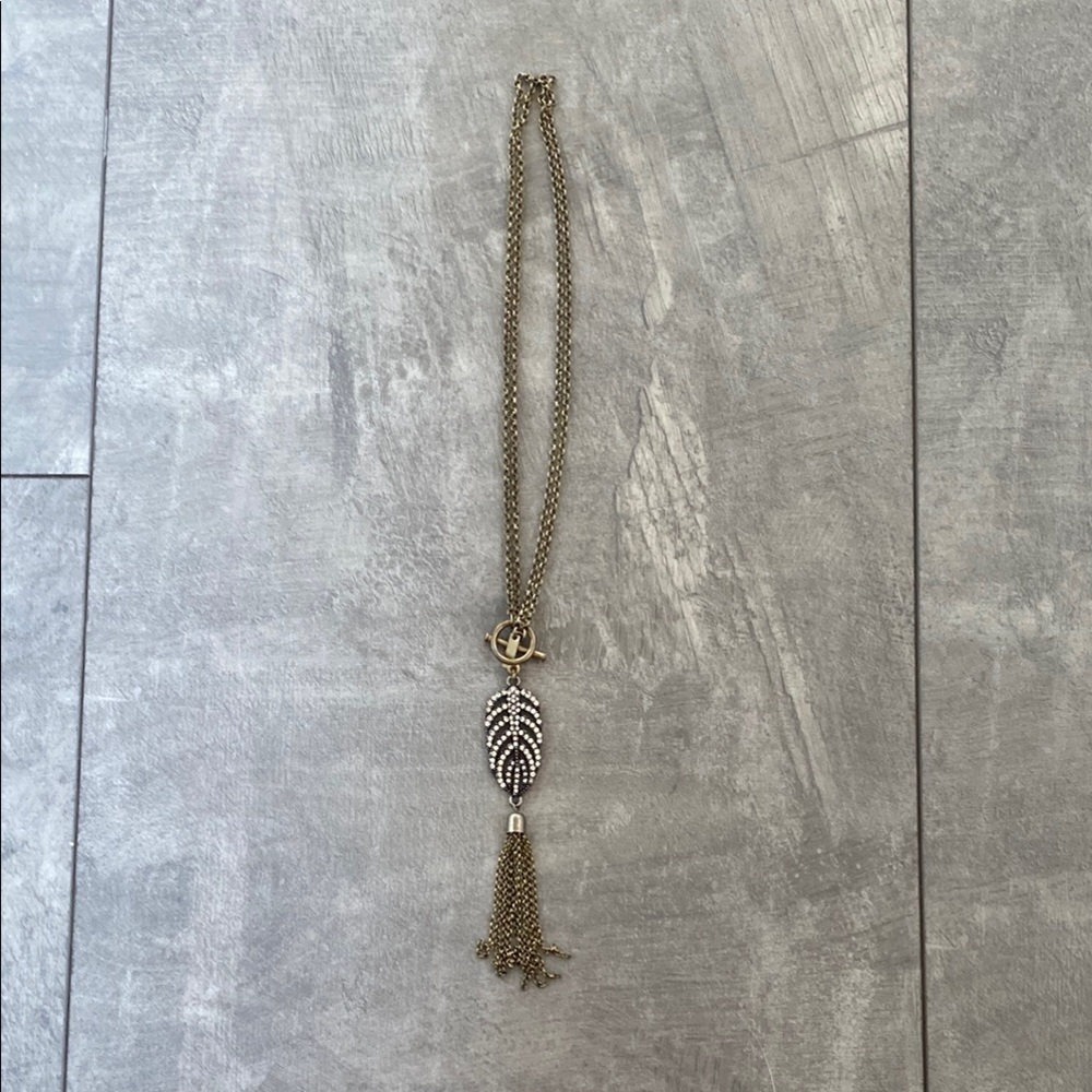 Elegant Gold Necklace with Feather Pendant
